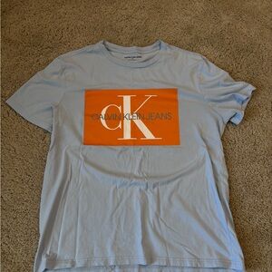 Calvin Klein Jeans Light Blue Tee with Orange Logo Panel